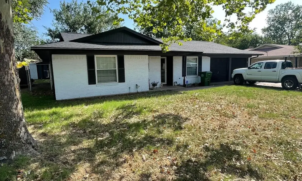Professional roofing crew working on a residential roof in Rancho San Diego